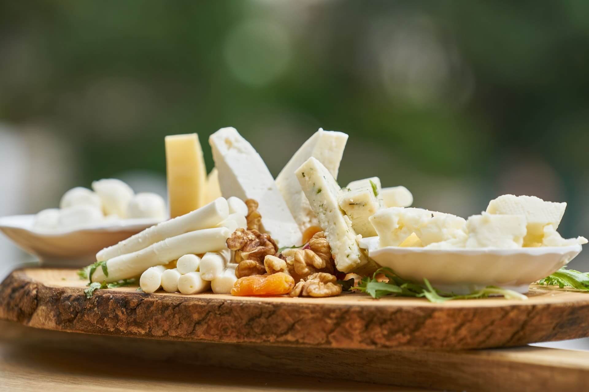 Various Cheese On Top of Wooden Board